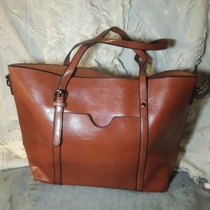 The Kyra Collection vegan leather satchel